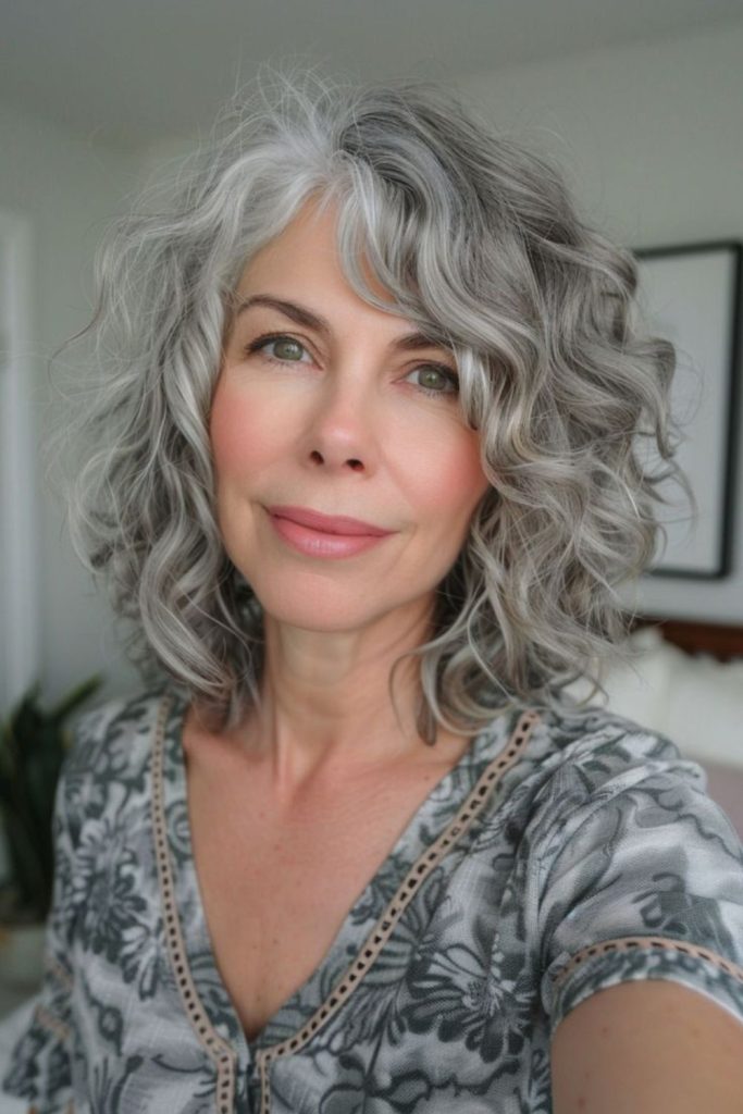 Glacier twist crown layered gray curls lifted volume