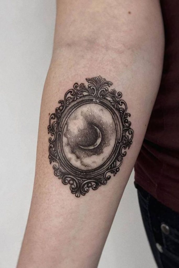 Crescent moon mirror reflection tattoo design