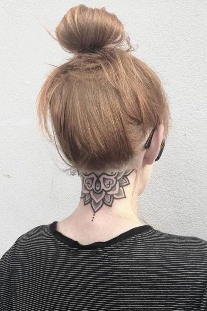 Mandala hairline tattoo spiritual symmetry design.