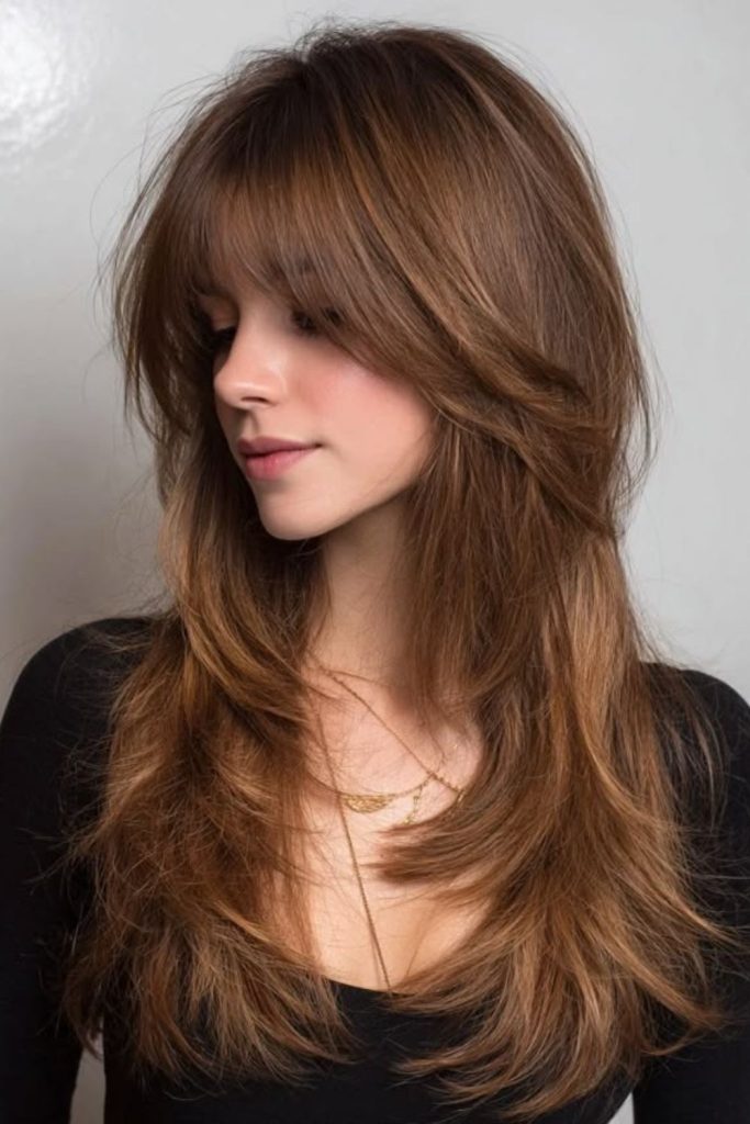Maple toned layers and feathered fringe.