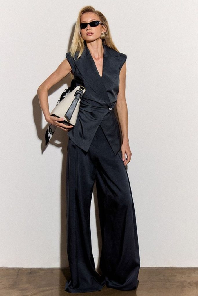 Monochrome sleeveless blazer powerful office outfit