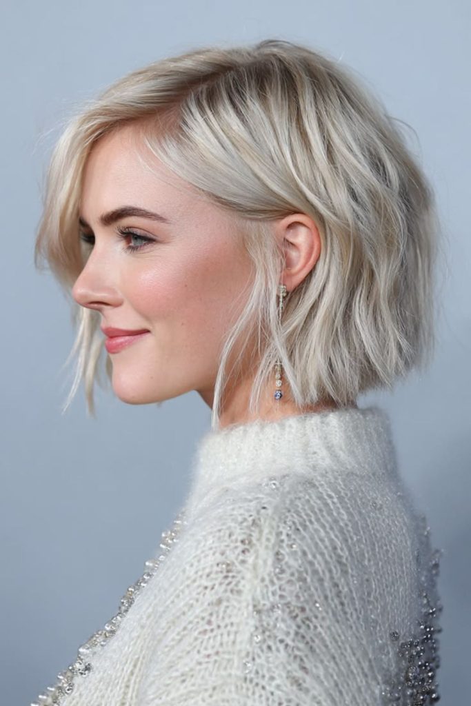 Sleek bob haircut with blunt ends.