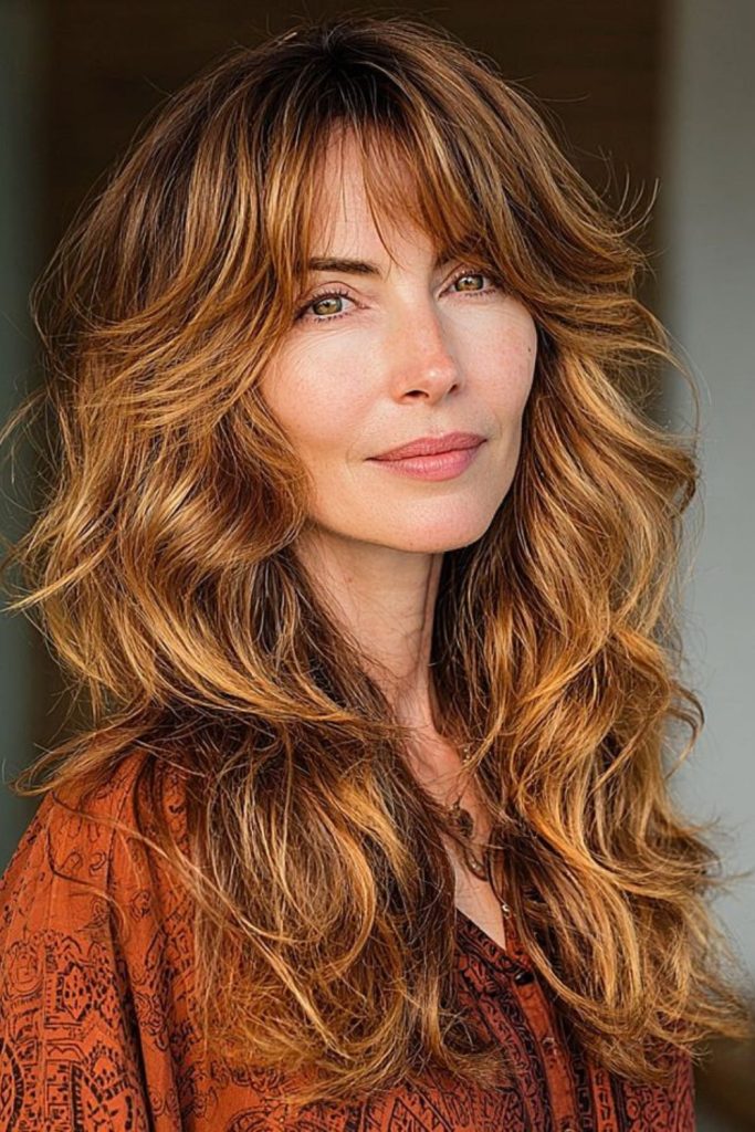 Rust toned flowing silk layered hair