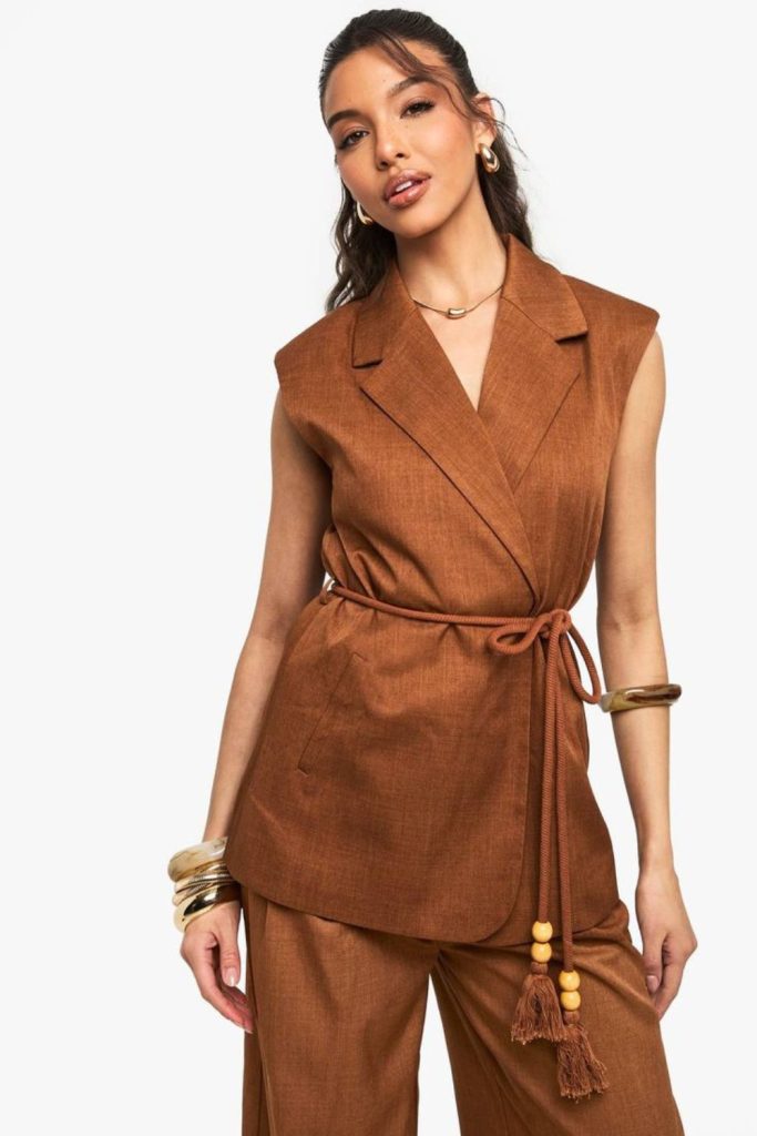 Terracotta sleeveless blazer earthy stylish outfit