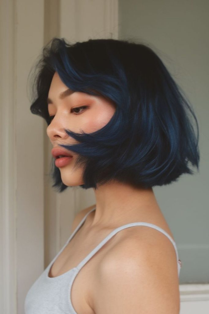 Swing bob hairstyle with sleek movement.