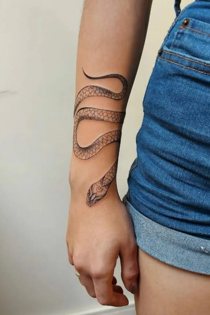Serpent coil wisdom transformation tattoo art