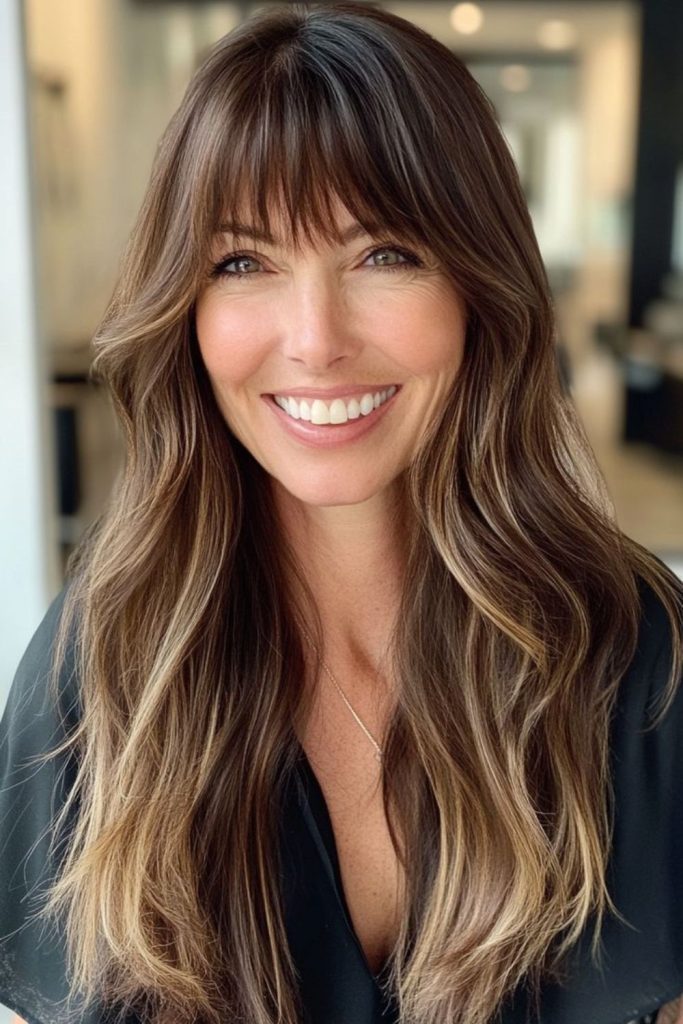 Smoky brunette drift layered fringe style