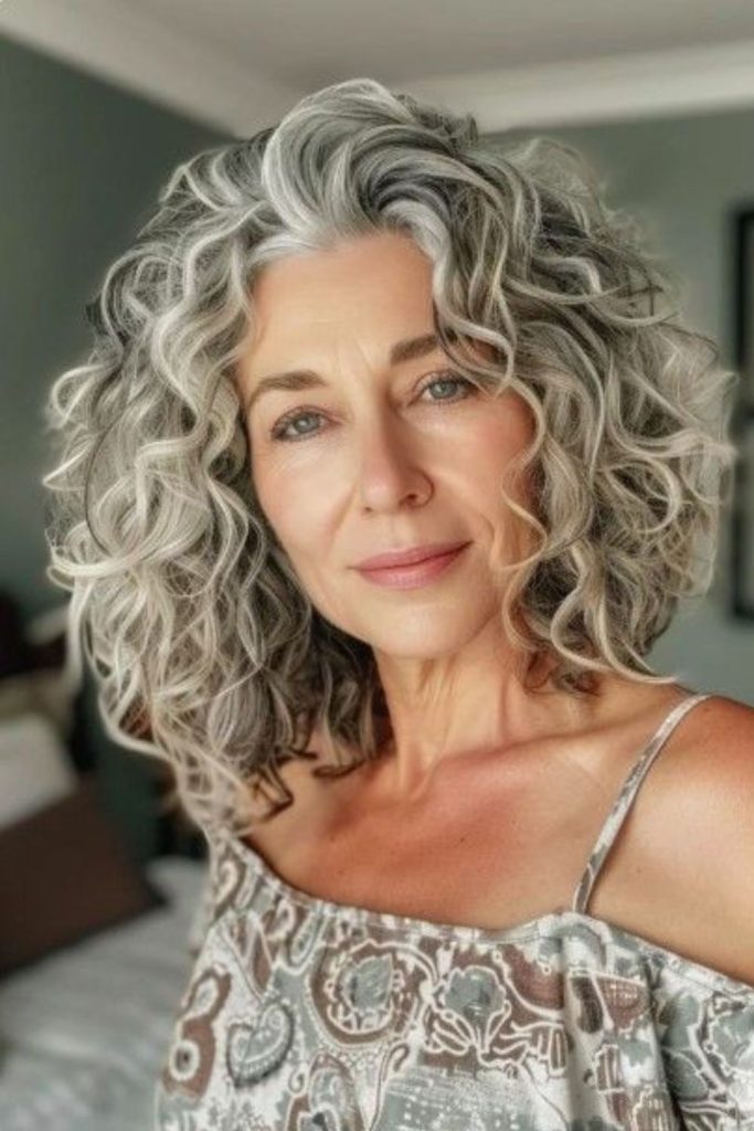 Smoky layered puff shoulder curls soft blended texture