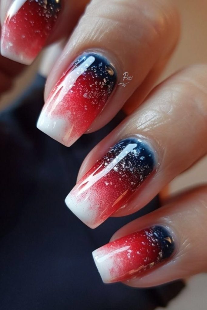 Starry freedom ombre manicure design.