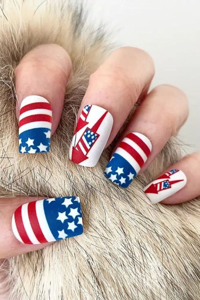 Silver lined patriotic sparkle nails.