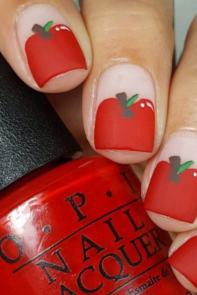 Red apple accent back-to-school manicure.