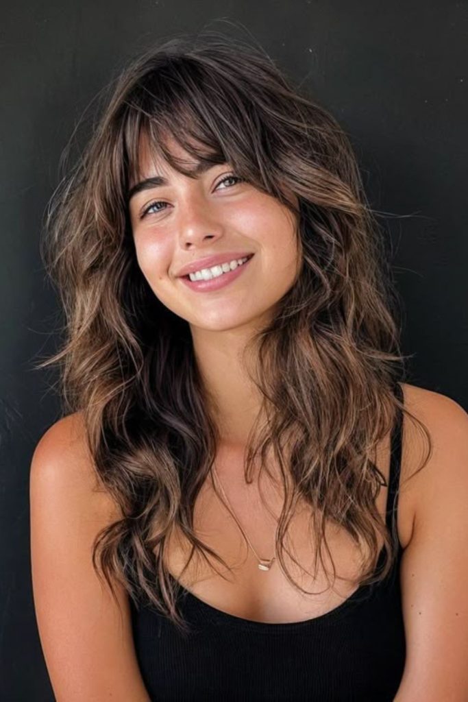 Autumn Muse Bangs with warm copper tones.