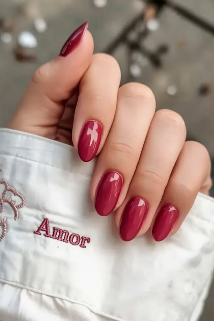Berry floral glossy elegant nail design.