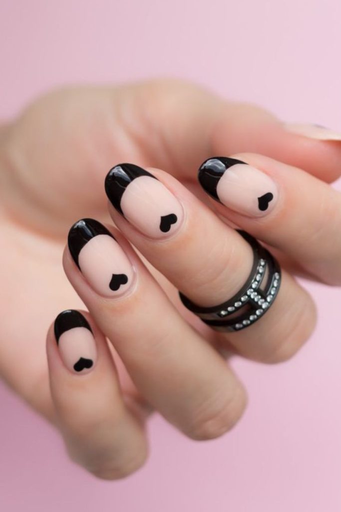 Black heart French tip nails