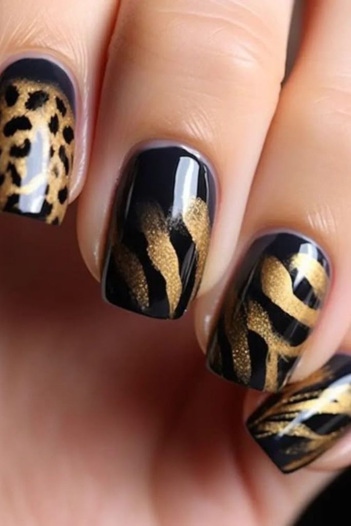 Black gold lion zodiac nails
