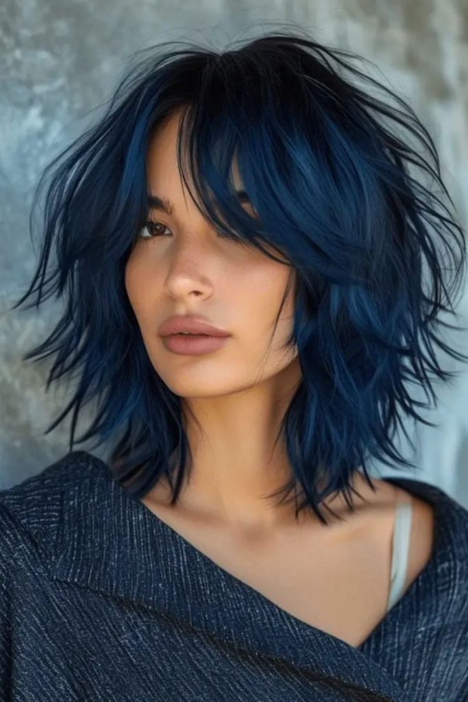 Blue flame shag with vibrant highlights.