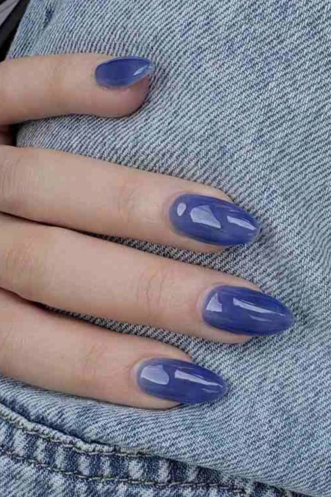 Blueberry shimmer glossy nail art style.