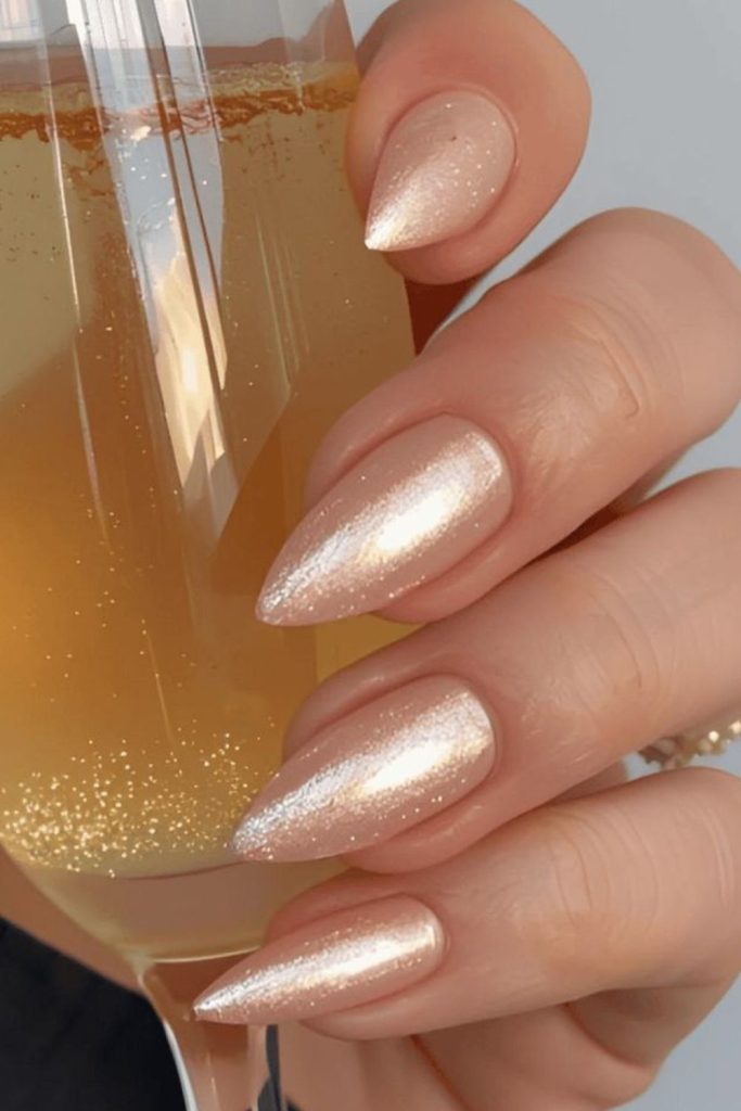 Champagne French tip elegant manicure.