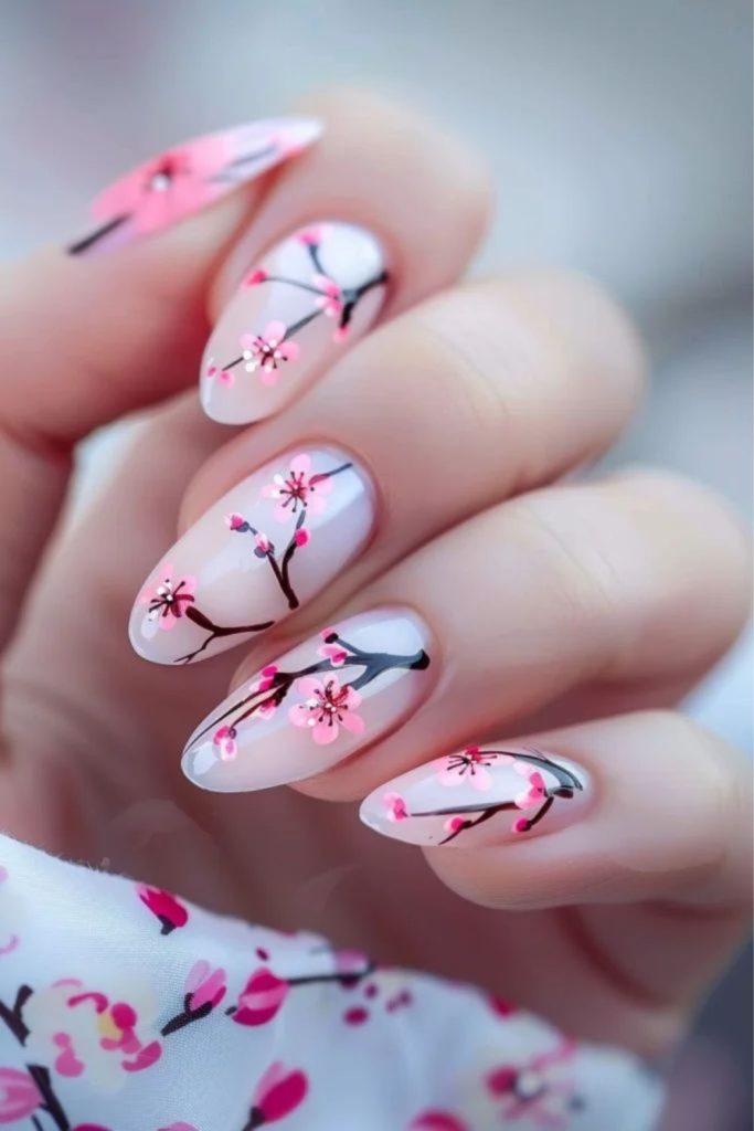 Cherry blossom nude floral manicure.