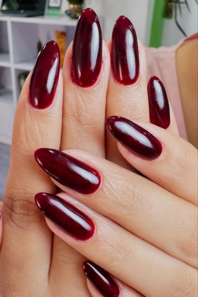 Cherry cola nails with cherry accents.
