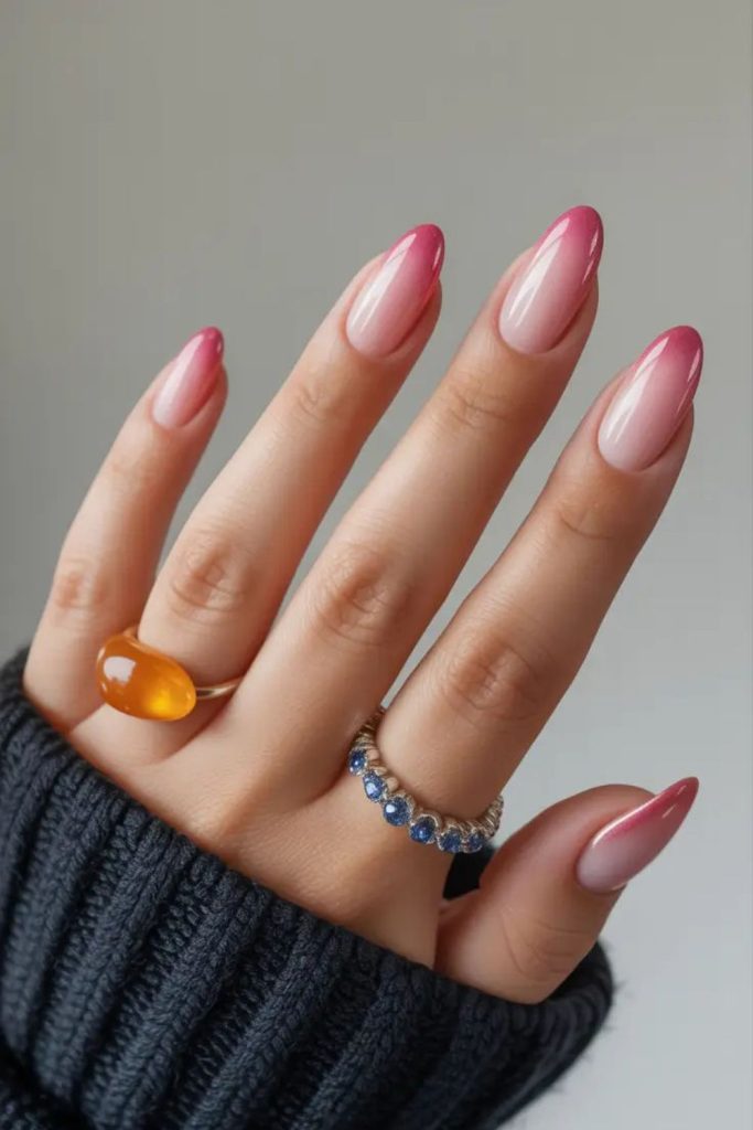 Chrome aura nails with luminous shimmer.