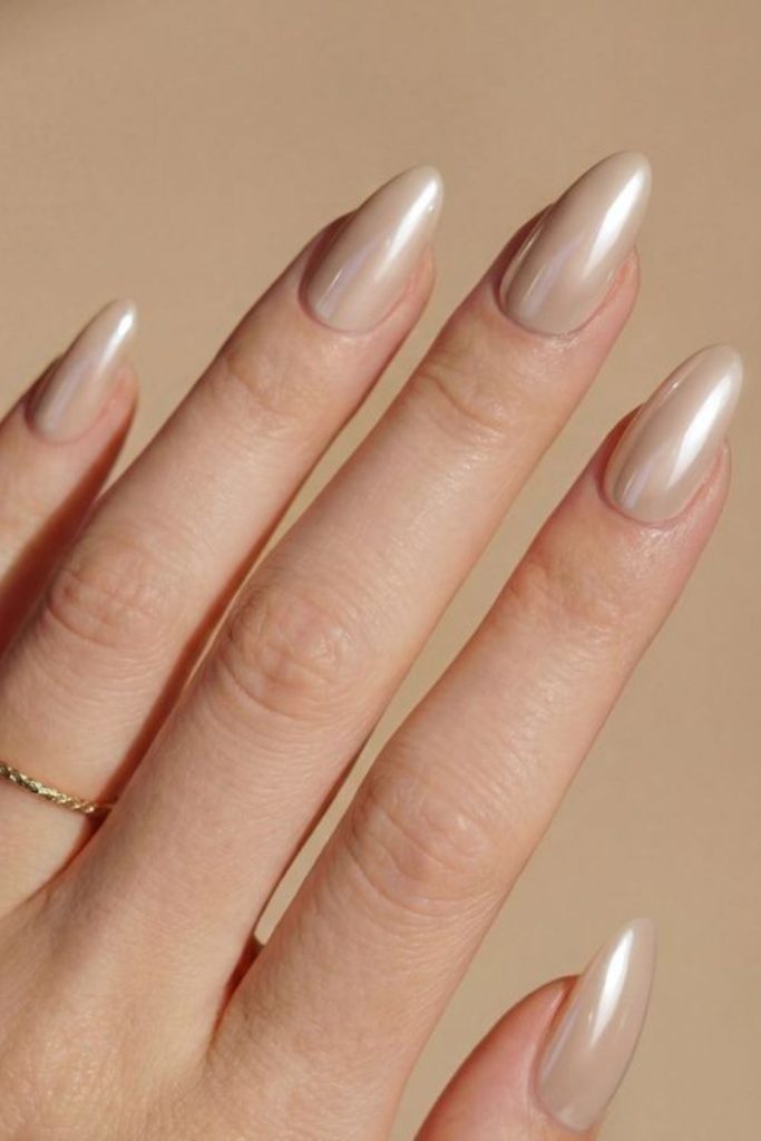 Coconut latte neutral glossy nails.