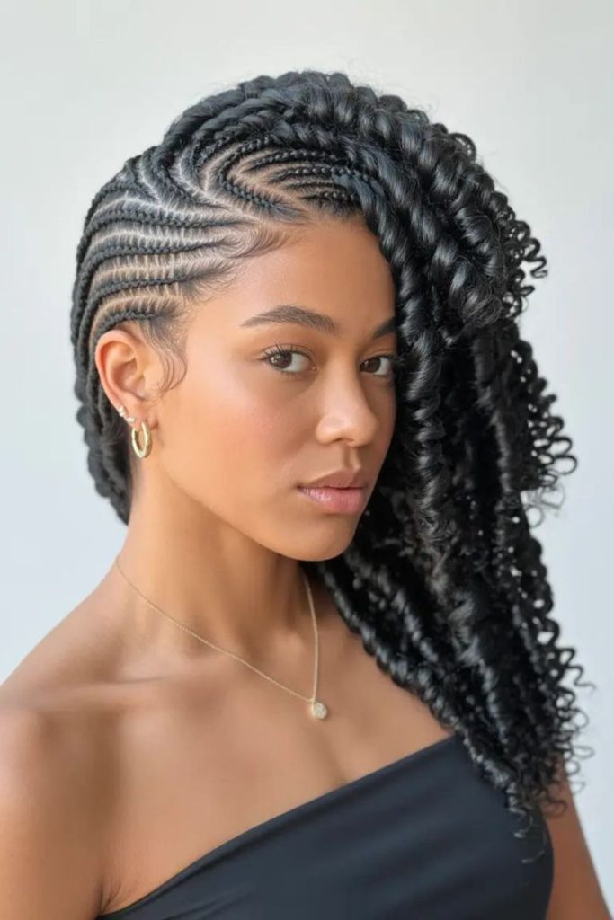 Cornrows with soft curly ends.