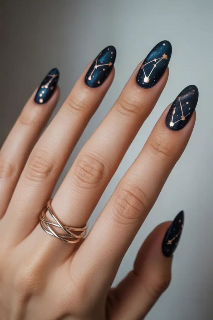 Cosmic nails with sparkling celestial stars.