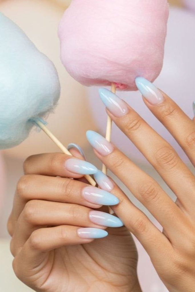 Pastel cotton candy gradient nail design.