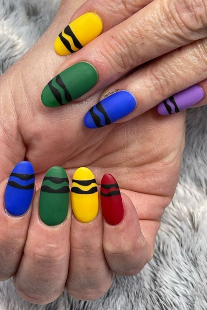 Bright crayon themed teacher nail art.