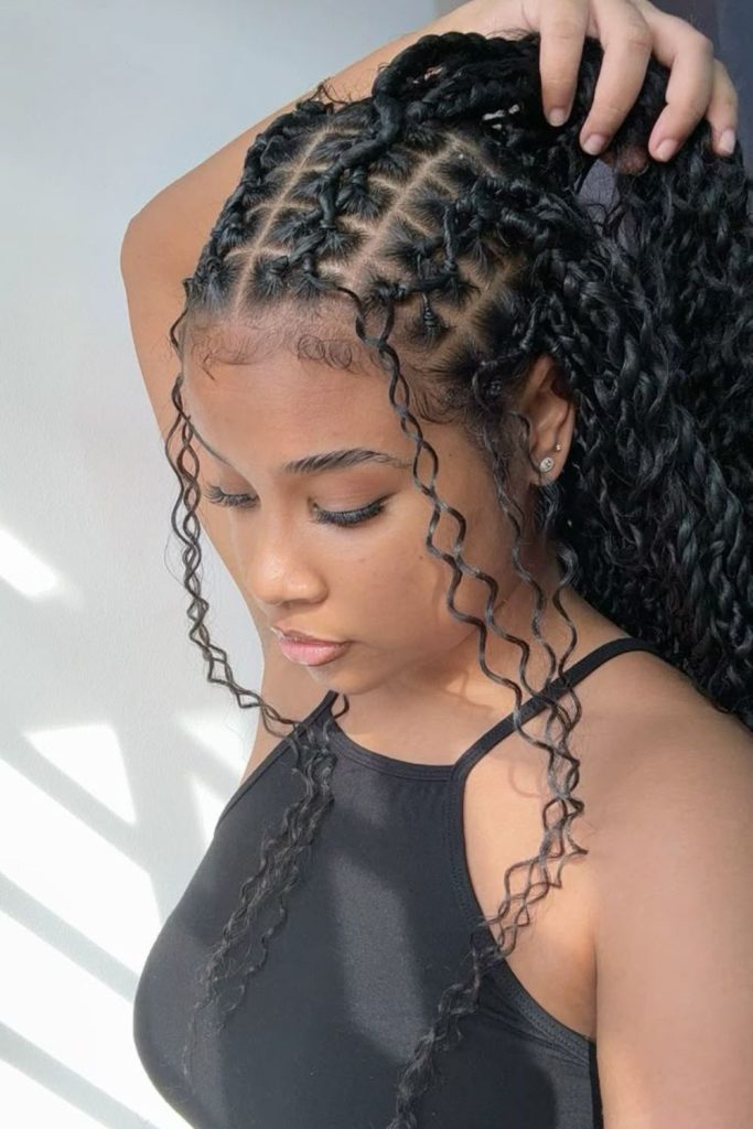 Modern crisscross patterned cornrow braids.