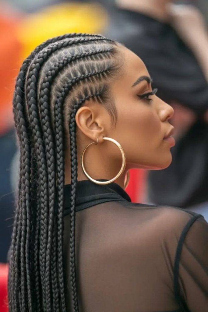 Sleek straight-back crown cornrows hairstyle.