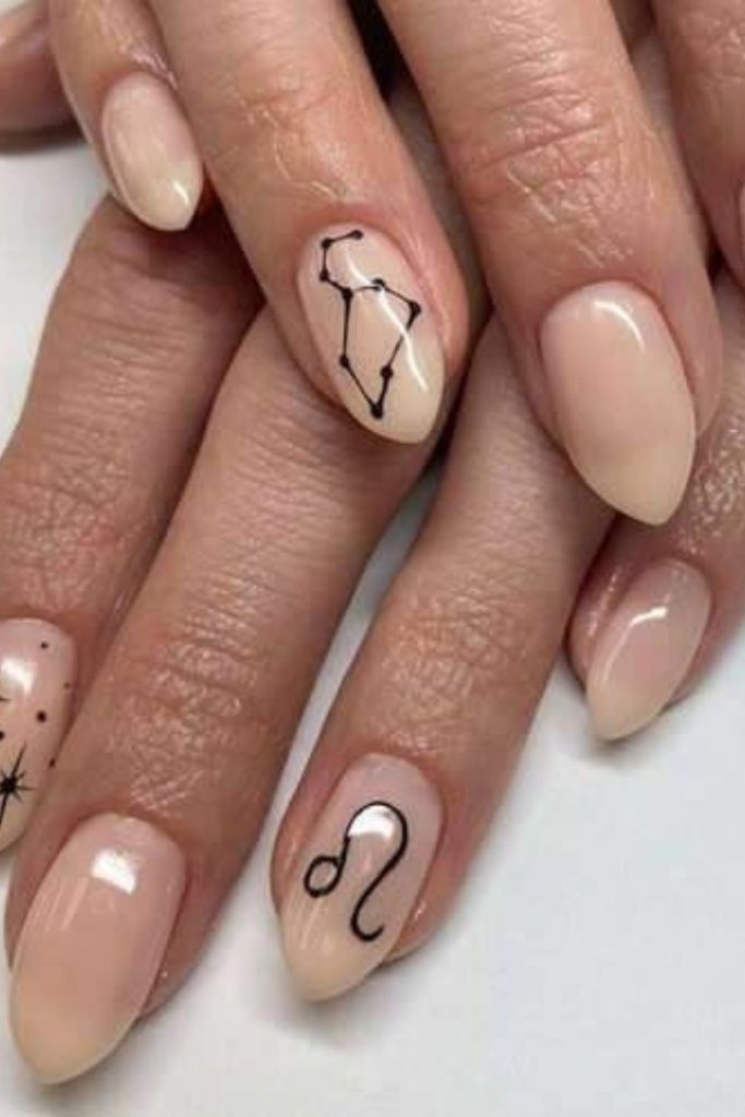 Crowned lioness glam zodiac nails