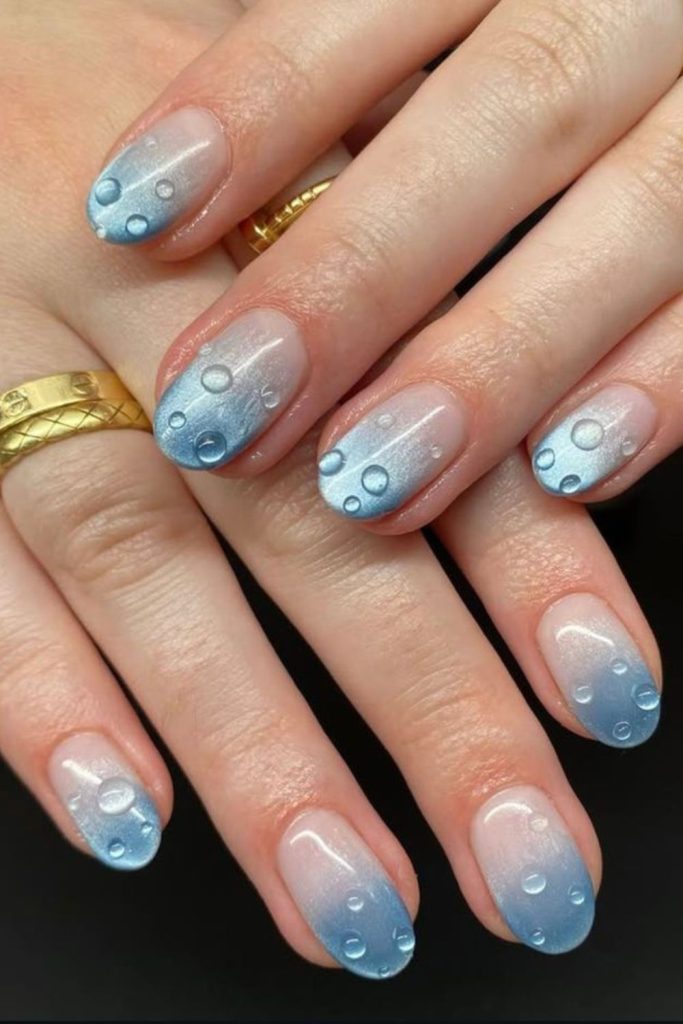 Milky white dew drop nails.