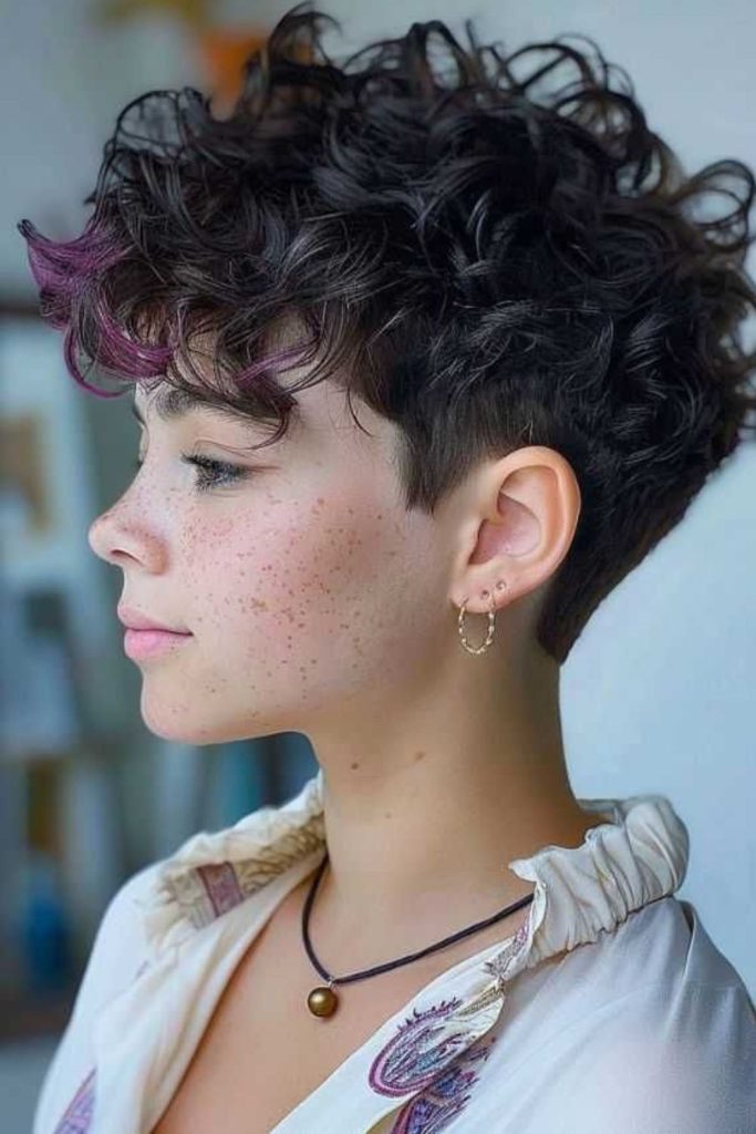 Curly cropped natural short hairstyle.