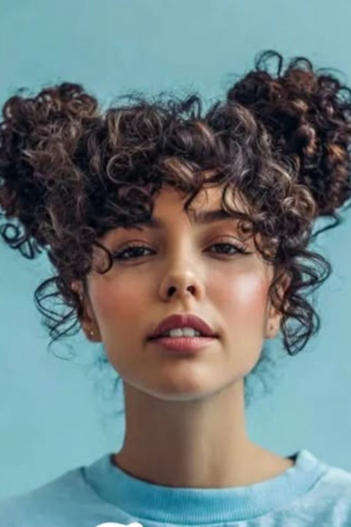 Curly side puff natural hairstyle.