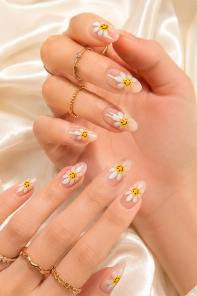 White daisy floral nude nail design.