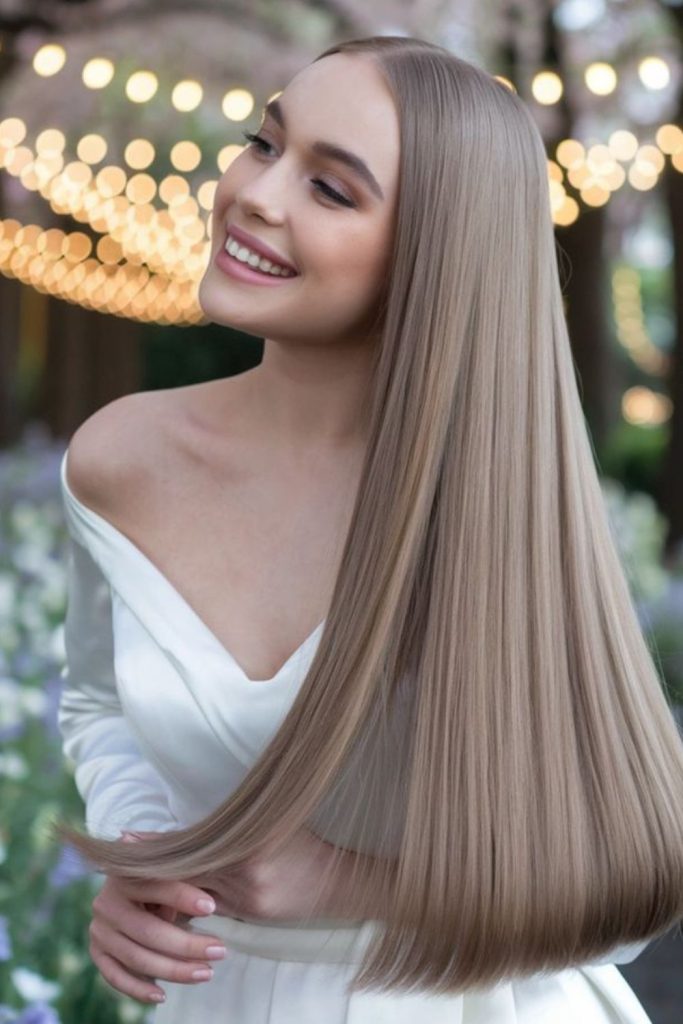 Extra-long silky straight bridal hairstyle.
