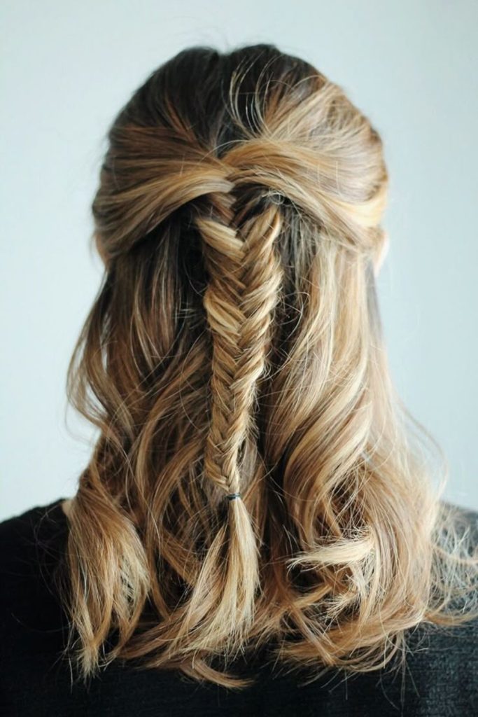 Half-up fishtail braid hairstyle.