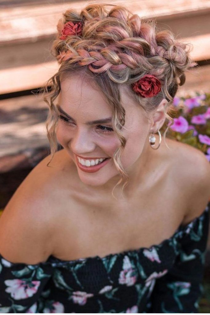 Frida-inspired floral crown hairstyle.