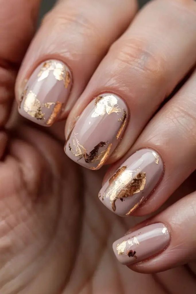 Champagne gold foil elegant nails.