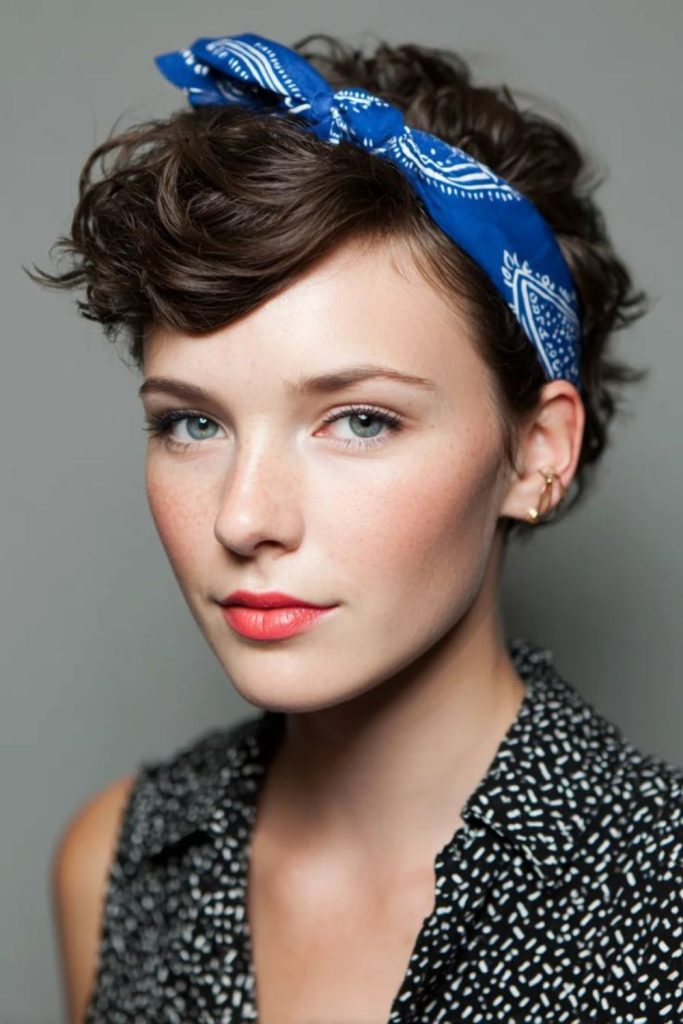 Pixie hairstyle with colorful headband.