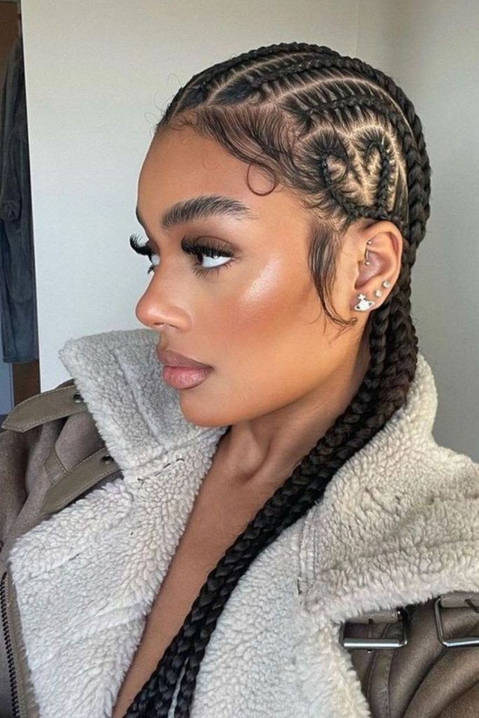 Heart-part natural cornrow hairstyle.
