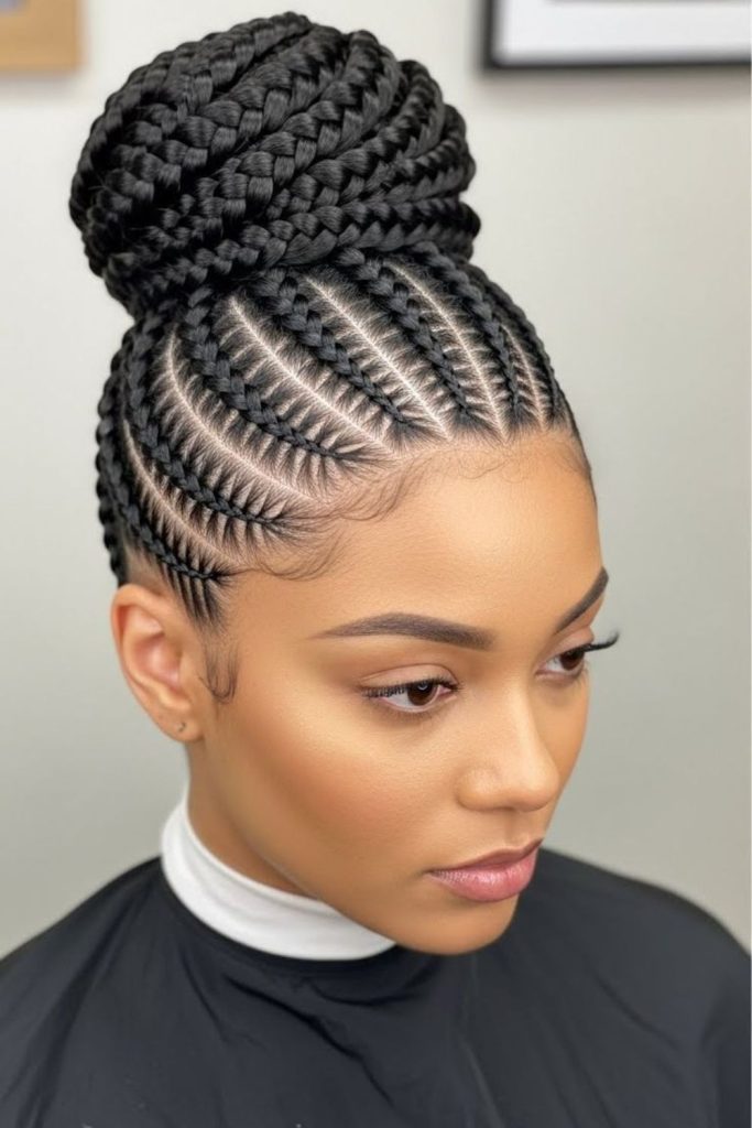 High bun braided natural cornrows style.