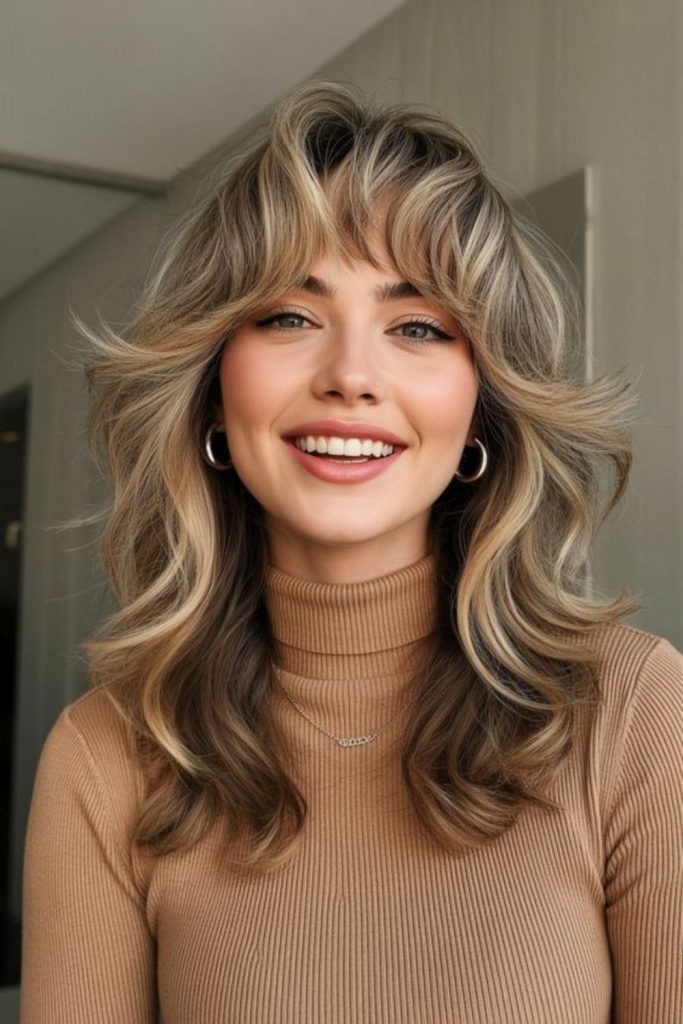 Honey glow wolf cut with bangs.