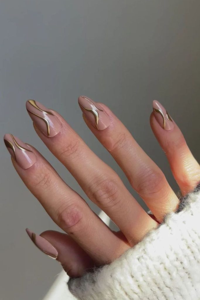 Honey swirl nude nail art.