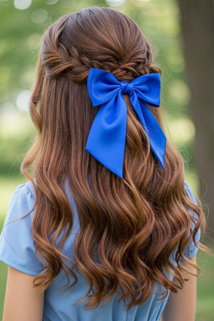 Knotted half pony loose hairstyle.