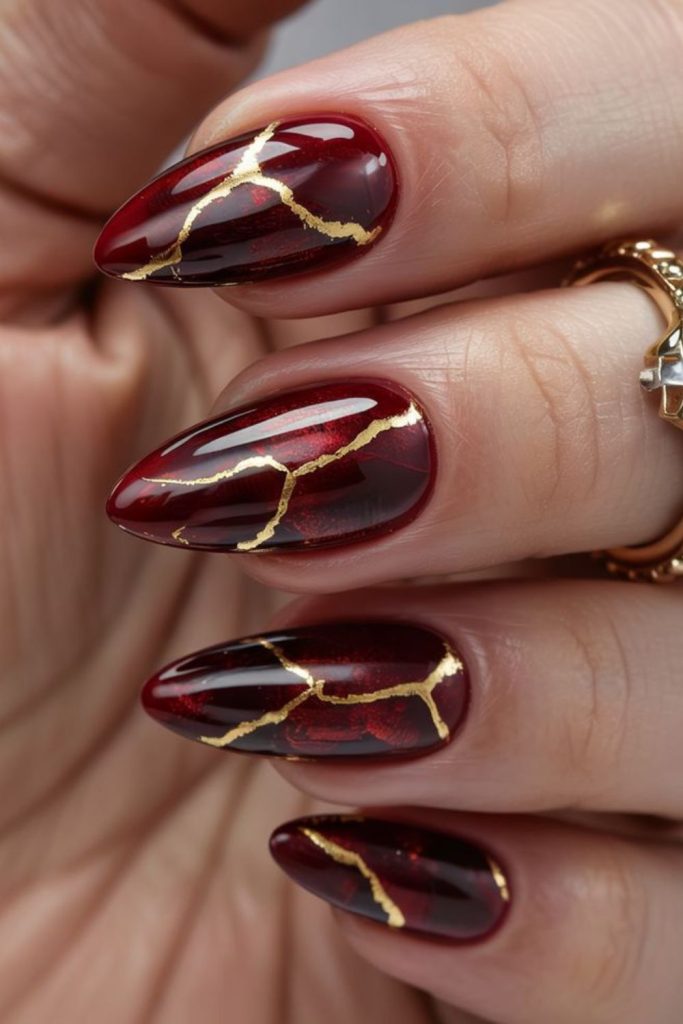 Bold crimson Leo power nails