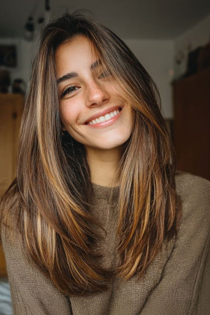 Maple glow long straight hairstyle.