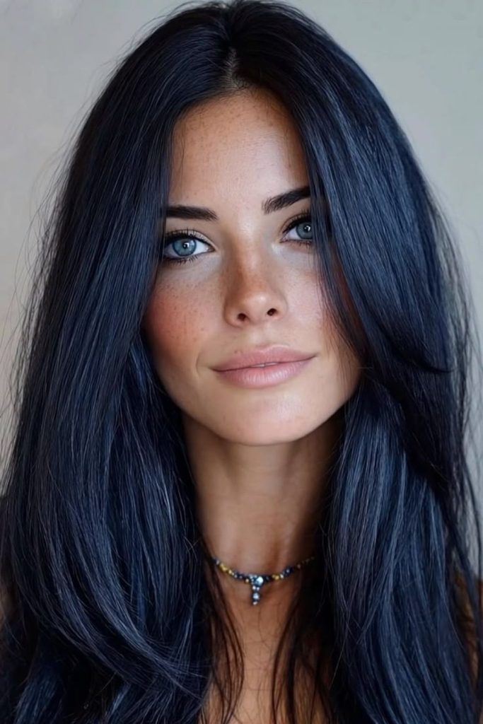 Midnight ink layered straight hairstyle.